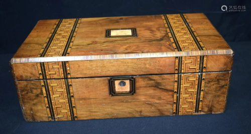 A large Tunbridge ware work box with sloping interior.