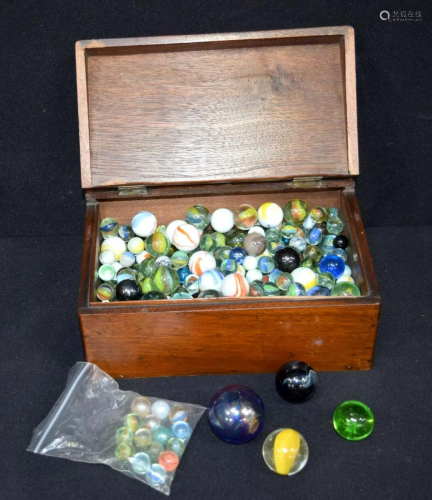 A large collection of marbles. (Quantity)
