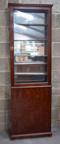 A large mahogany glass fronted display cabinet 204 x 61
