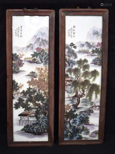A pair of Chinese porcelain panels in hardwood frames