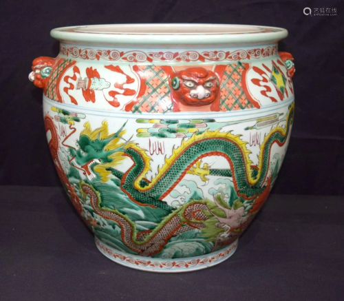A large Chinese polychrome porcelain planter decorated
