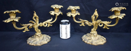 A pair of 19th century gilded ormolu table mounted