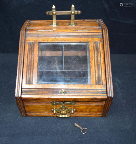 An unusual Mid century desk top glass fronted wooden