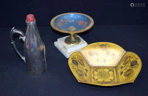 A lacquered Taza on a plinth together with a plated