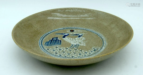 A Chinese porcelain crackle glazed dish decorated with