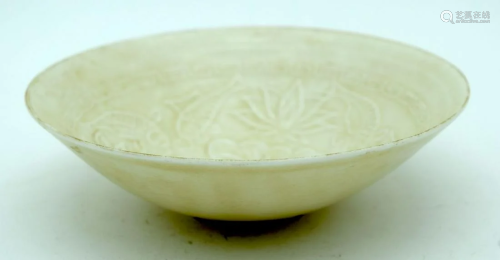 A Chinese Ding ware porcelain bowl decorated with fish