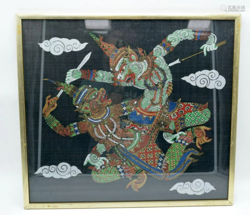 A framed South east Asian print on fabric of two beasts