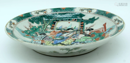 A Chinese porcelain famille-verte dish decorated with