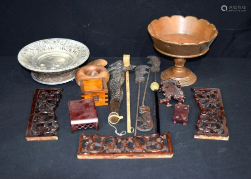 A collection of wooden items including carved Chinese