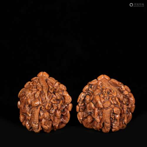 A pair of chinese carved walnuts