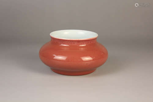 A Red Glazed Porcelain Washer