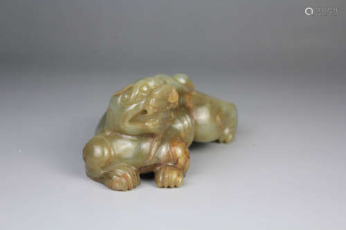 A Jade Carved Laying Beast Ornament