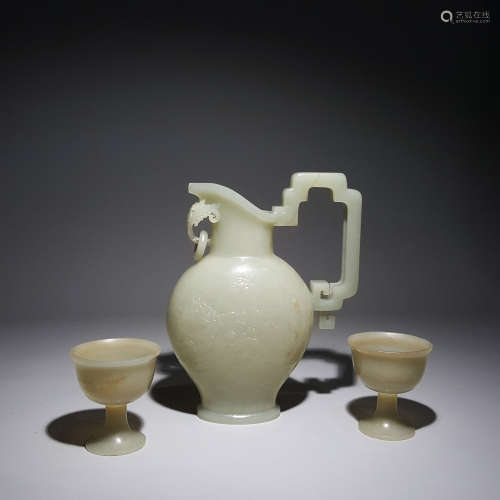 A Set Of Carved Dragon Pattern Jade Wine Pot And Cups