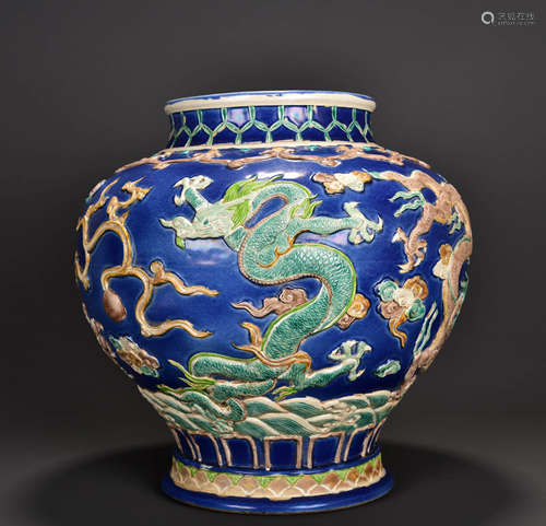 A Large Blue Carved Sea And Dragon Pattern Porcelain Jar