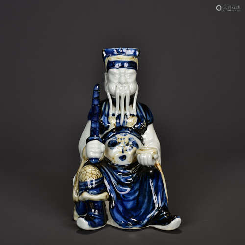 A Blue And White Glazed Emperor Zhenwu Porcelain Statue