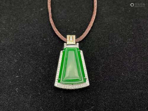 A Green Jadeite Pendant