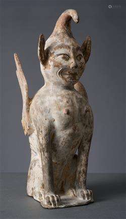A CHINESE PAINTED POTTERY TOMB GUARDIAN FIGURE  TANG DYNASTY...