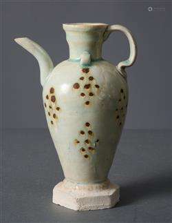 A CHINESE IRON-SPOTTED QINGBAI EWER  YUAN DYNASTY (1279-1368...