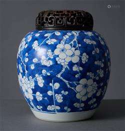 A CHINESE BLUE AND WHITE PLUM BLOSSOM AND CRACKED-ICE JAR
QI...