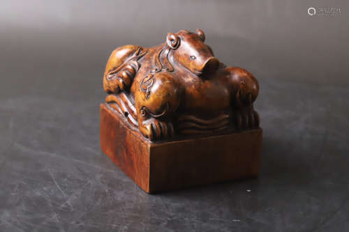 A Carved Beast Wood Seal