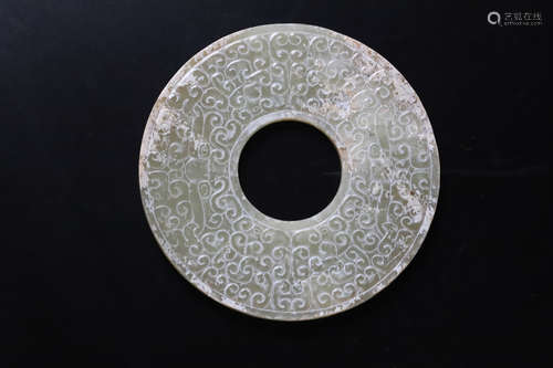 A Carved Jade Bi Pendant