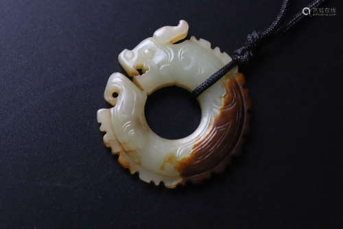 A Carved Jade Dragon Ring Pendant