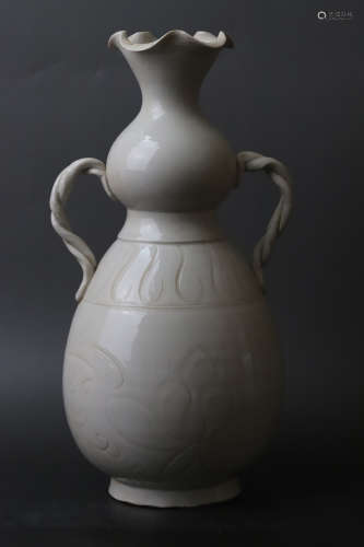 A Ding Kiln White Glazed Flower Pattern Double Ear Porcelain...