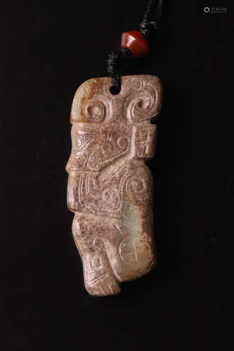 A Carved Jade Man Pendant