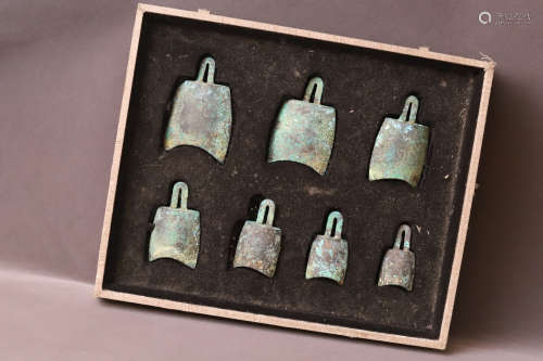 A Group of Seven Chinese Bronze Chimes Set