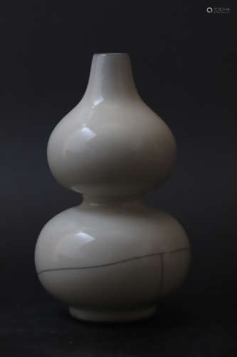 A White Glazed Gourd Shape Porcelain Vase