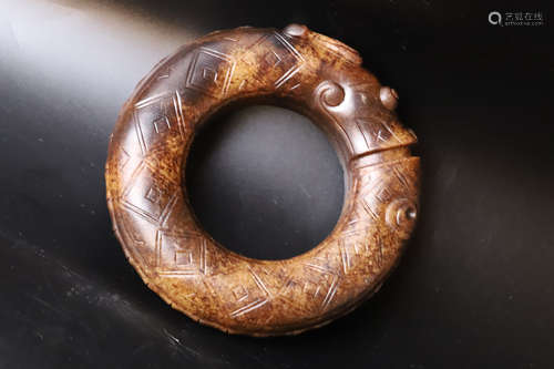 A Carved Dragon Jade Ring