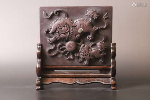 A Carved Stone Lion Pattern with Wood Stand Table Plaque