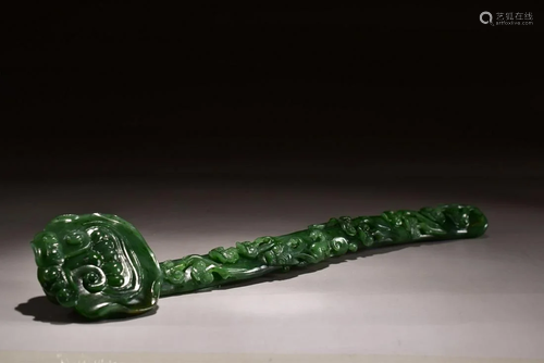 A CARVED SPINACH-GREEN JADE RUYI SCEPTER