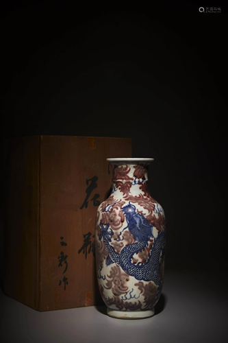 A COPPER RED GLAZE AND UNDERGLAZE BLUE DRAGON VASE