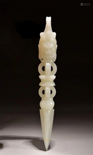 A CARVED HETIAN JADE VAJRA