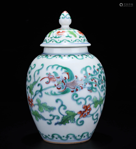 A DOUCAI PHOENIX AND FLOWER JAR AND COVER