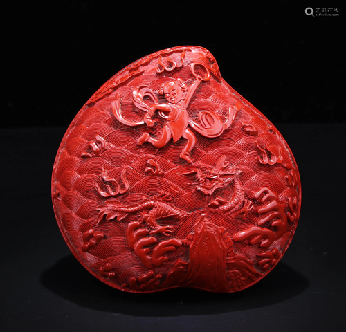 A CARVED CINNABAR LACQUER NEZHA AND SEA BOX & …