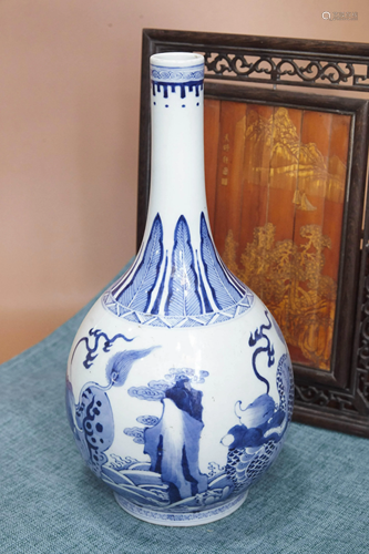 A BLUE AND WHITE BEAST BOTTLE VASE