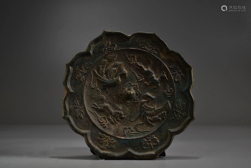 A BRONZE FOUR BEASTS LOBED MIRROR