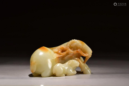 A CARVED JADE FIGURE OF RAM AND LINGZHI