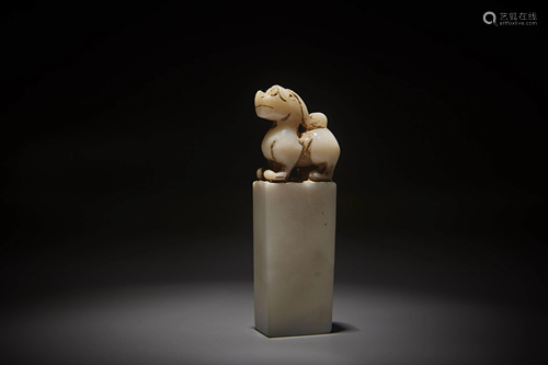 A CHINESE HETIAN JADE BEAST SEAL