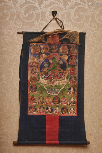 A CHINESE THANGKA OF GREEN TARA