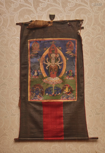 A CHINESE THANGKA OF ELEVEN-FACE AVALOKITESVARA