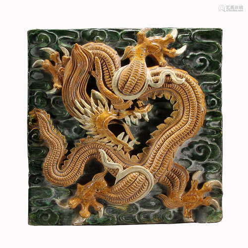 Ancient tricolor dragon brick carving