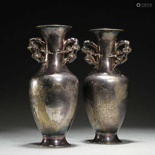 A pair of silver bottles, 19th century