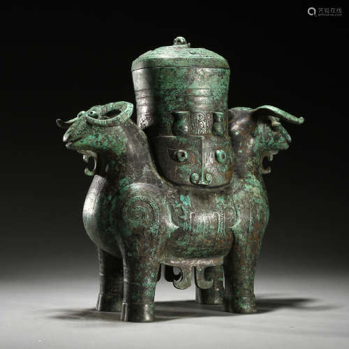 Ancient bronze head vessel
