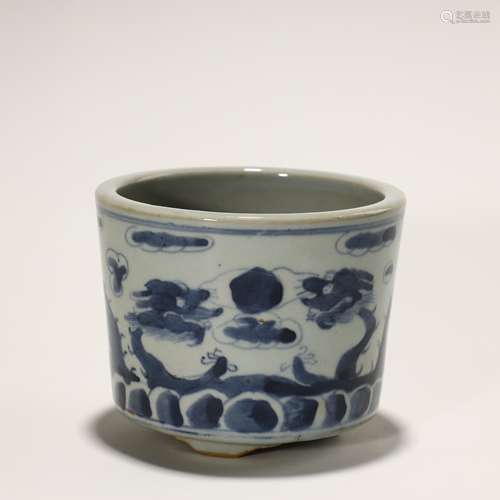 Ancient blue and white three-legged incense burner with drag...