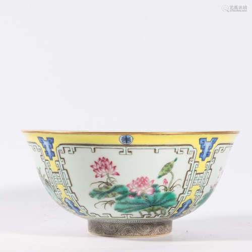 A YELLOW GROUND ENCLOSING ‘FLOWER’ BOWL
