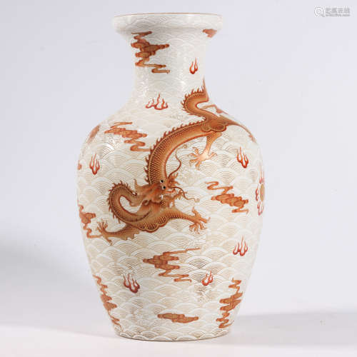 AN IRON-RED GLAZE ‘DRAGON AND CLOUD’ VASE