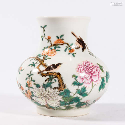 A FAMILLE ROSE ‘FLOWER AND BIRD’ BOTTLE VASE